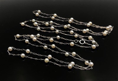 Lot 2549 - A Belle Epoque platinum and pearl long...
