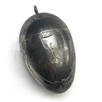 Lot 2558 - A Russian silver egg with Niello engine turned...