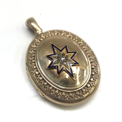 Lot 2565 - A Victorian gold oval locket, the centre with...