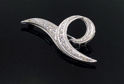 Lot 2567 - An 18ct white gold 1950's brooch set with...
