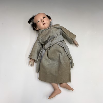 Lot 623 - JAPANESE DOLL: A porcelain headed Japanese...