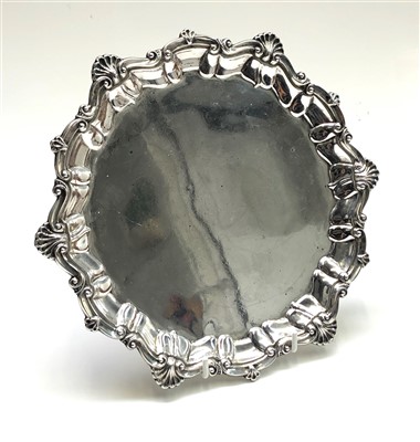 Lot 2012 - An Edwardian silver tray with scroll and shell...