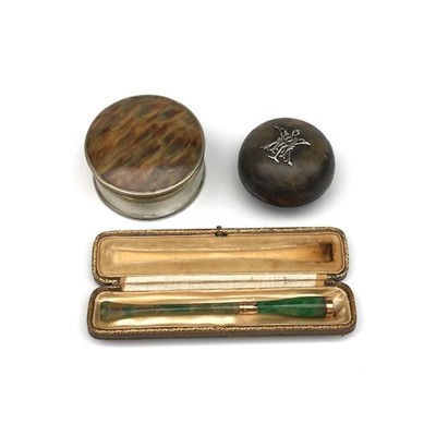 Lot 2437 - A gold mounted cigarette holder case, a silver...