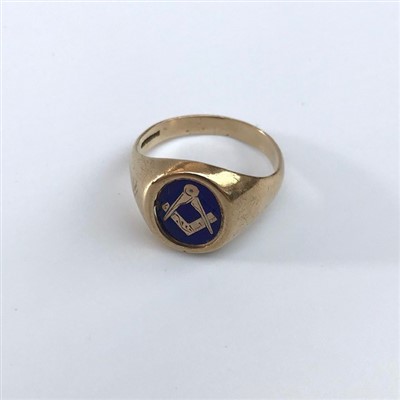 Lot 2442 - A 9ct gold Masonic ring with rotating blue...