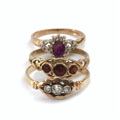 Lot 2445 - Three gold rings.