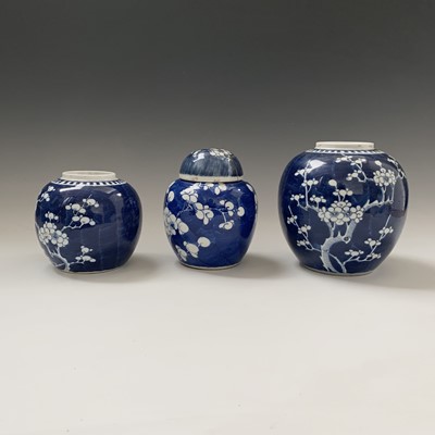 Lot 168 - Three Chinese blue and white prunus pattern...
