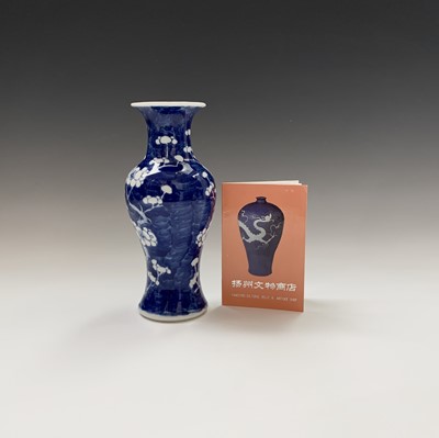 Lot 169 - A Chinese blue and white prunus pattern vase,...
