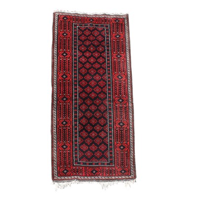 Lot 470 - A fine Belouch rug, the charcoal field with...