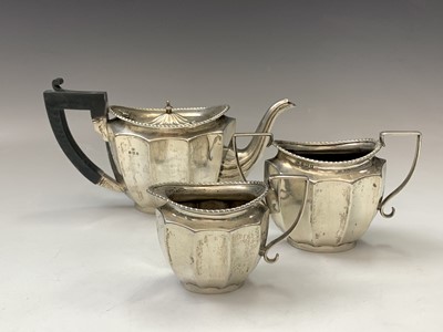 Lot 133 - A silver Georgian style three-piece tea...
