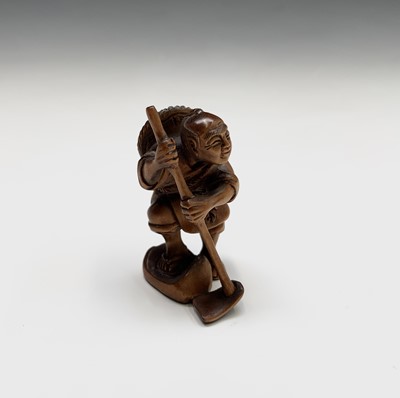 Lot 232 - A Japanese carved wood netsuke, signed, 20th...