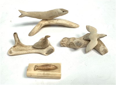 Lot 65 - Inuit sculpture, a caribou antler and bone...