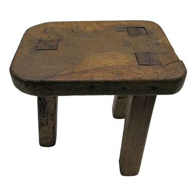Lot 71 - A Cornish rustic milking stool, 19th century,...