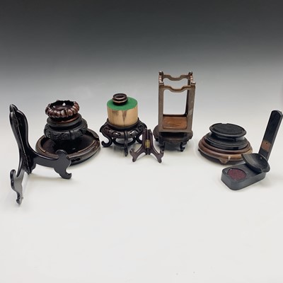 Lot 262 - A selection of Chinese wood vase stands and a...