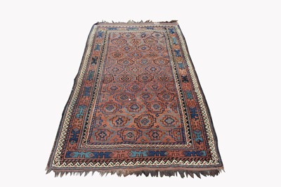 Lot 499G - A Belouch rug, with multiple rows of...