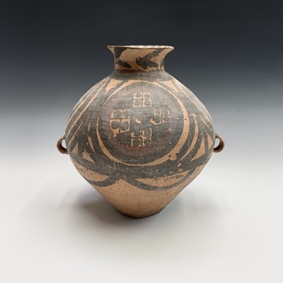 Lot 36 - A Chinese Neolithic painted pottery storage...