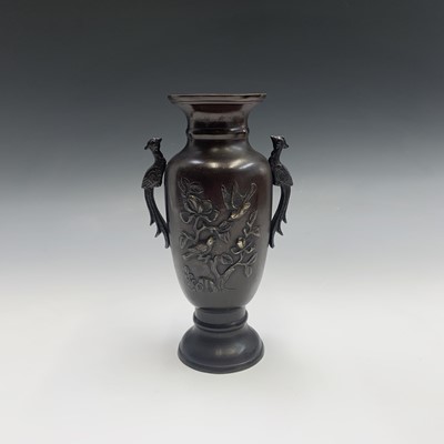 Lot 269 - A Japanese bronze twin-handled vase, Meiji...