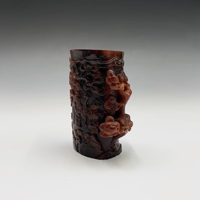 Lot 38 - A Chinese carved horn brush pot, height 11.5cm.