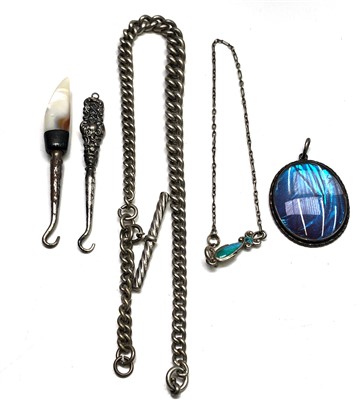 Lot 2528 - A heavy silver graduated curb link watch chain,...
