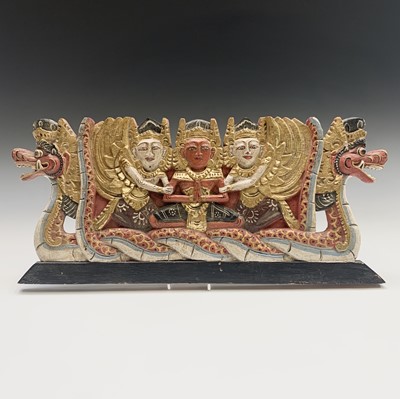 Lot 419 - A Thai gilded carved wood panel, 22 x 51cm.