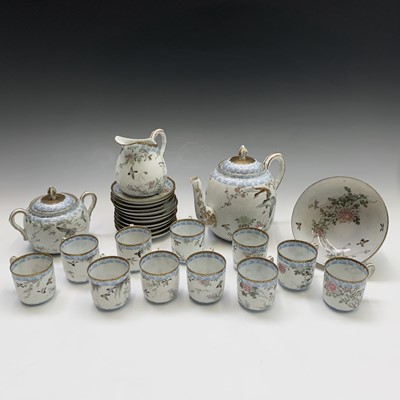 Lot 318 - A Japanese porcelain tea service, early 20th...