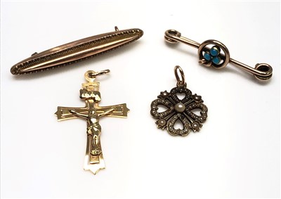 Lot 2536 - A small gold pendant with a circle of four...