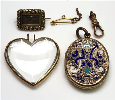 Lot 2537 - A gold mounted polished crystal heart, an...