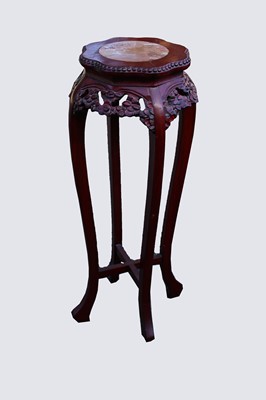 Lot 331 - A Chinese stained carved wood jardiniere stand,...