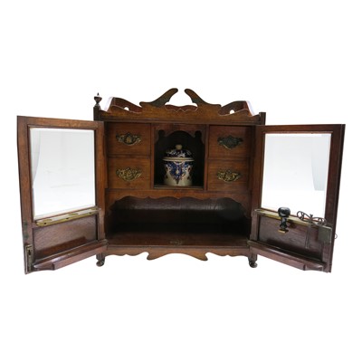 Lot 6 - An Edwardian oak smokers cabinet, height 45cm,...