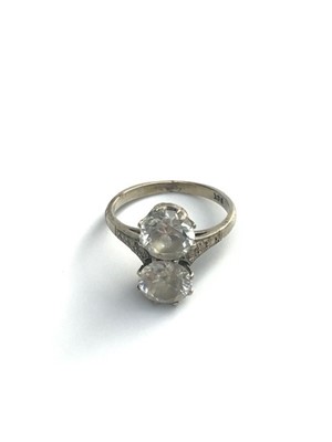 Lot 2749 - A 9ct white gold ring set with white stones.
