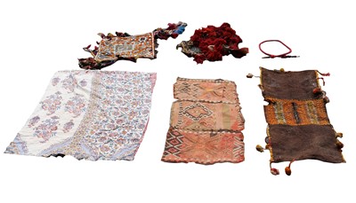 Lot 499X - A quantity of eastern textiles to include a...