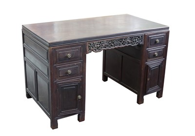 Lot 100A - A Chinese hardwood twin pedestal desk, late...