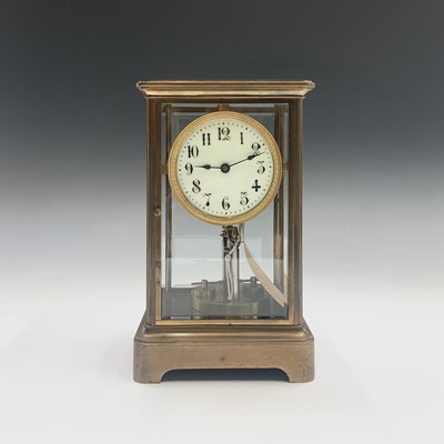 Lot 2936 - A German 400 day brass four glass torsion...