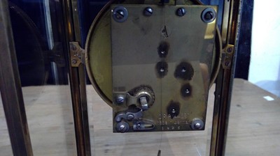 Lot 2936 - A German 400 day brass four glass torsion...