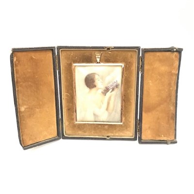 Lot 2623 - A 1920's portrait miniature, it shows a...