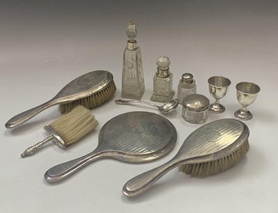 Lot 121 - A pair of plain silver egg cups, a late...