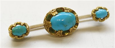 Lot 2782 - A high purity gold bar brooch set with turquoise.