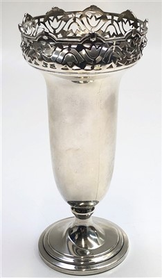 Lot 2054 - A footed silver vase the rim with pierced...