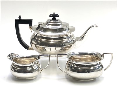 Lot 2064 - A three piece silver tea service by William...