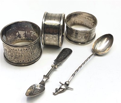 Lot 2072 - Three silver napkin rings, a silver filigree...