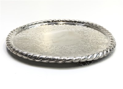 Lot 2084 - An engraved Victorian silver salver with rope...