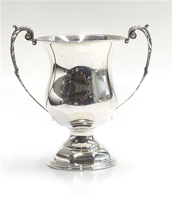 Lot 2087 - A footed silver trophy with twin scrolling...