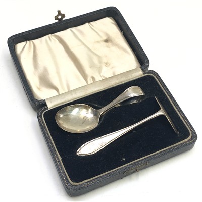 Lot 2092 - A cased silver spoon and pusher christening set.
