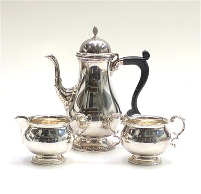 Lot 2104 - A Mappin & Webb three piece silver coffee...