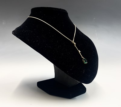 Lot 668 - A gold pendant set two brilliant cut diamonds...