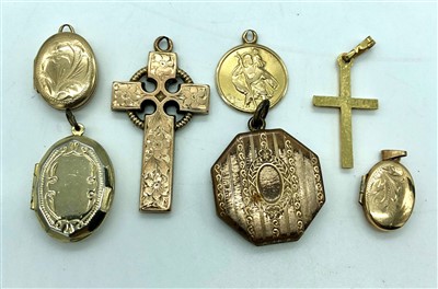 Lot 2454 - Four lockets, two crosses and a gold St....