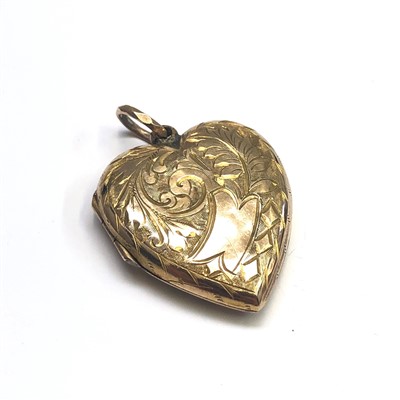 Lot 2602 - An engraved 9ct gold heart shaped locket.