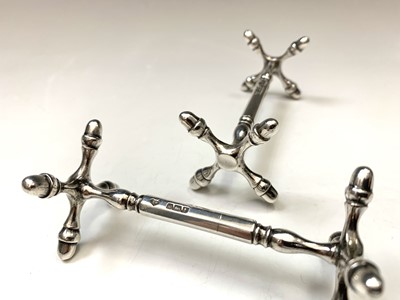 Lot 7 - A pair of silver knife rests by Martin, Hall &...