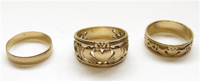 Lot 2809 - Two 9ct gold Claddagh rings, one pierced the...