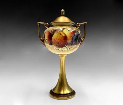Lot 800 - A Royal Worcester twin handled porcelain vase...