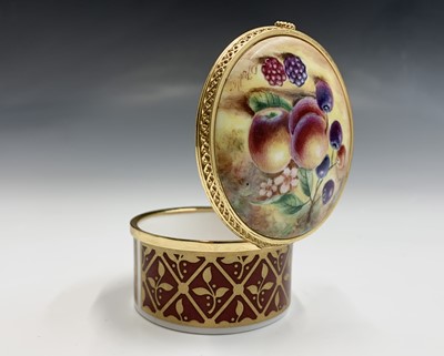 Lot 804 - A Royal Worcester fruit painted trinket box...